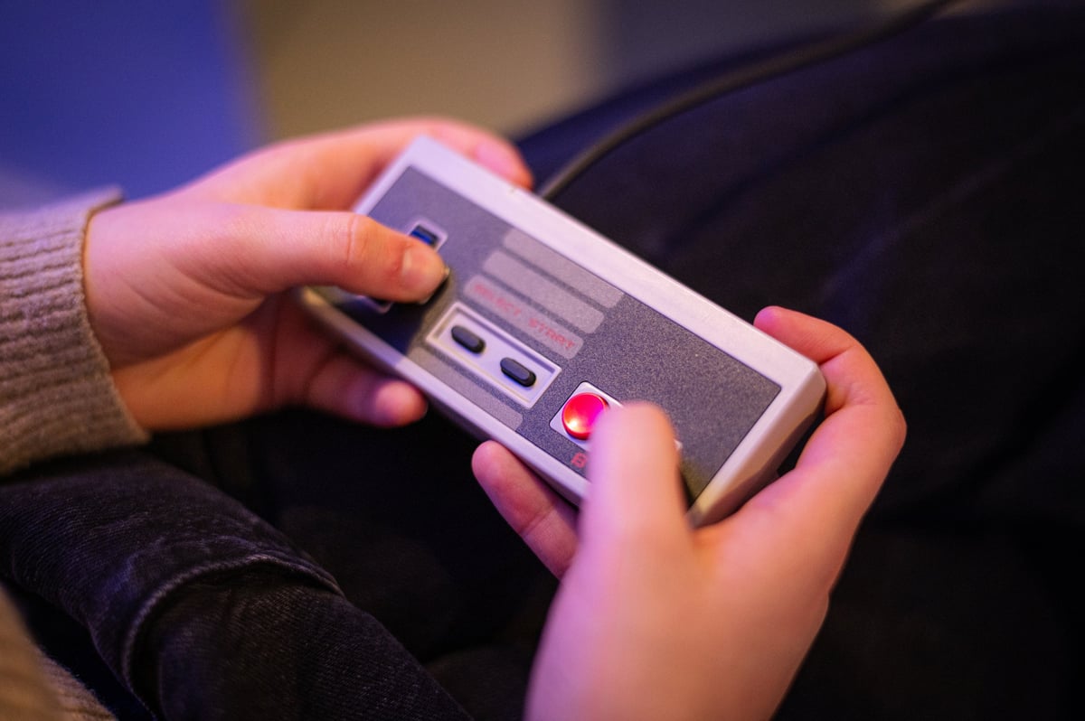 Classic arcade-style joystick controller representing retro gaming on Block Stream Gaming
